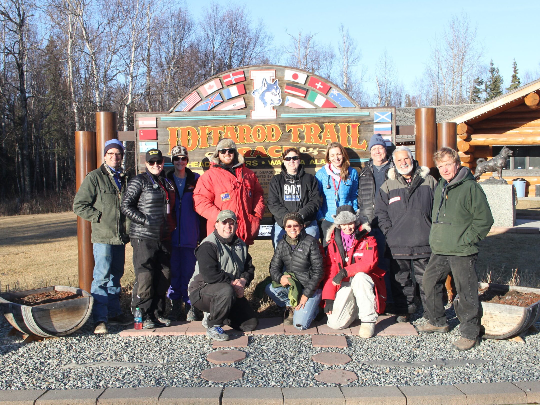 a group of people smiling at the camera