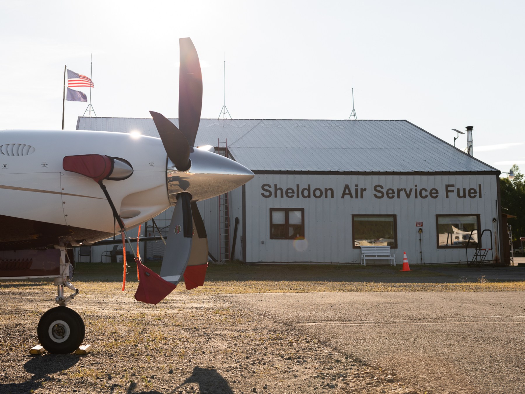Pipers in TKA Airport Alaska Summer 2025lane near Sheldon Air Service Fuel building under a partly cloudy sky.