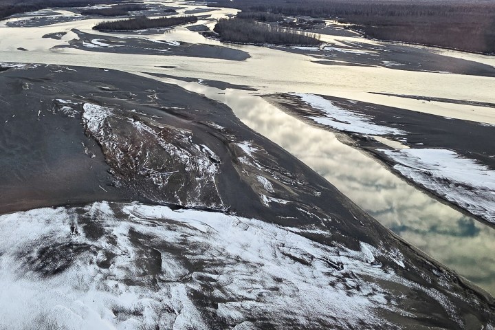 Aerial view of a snowy Talkeetna area rivers with meandering waterways.